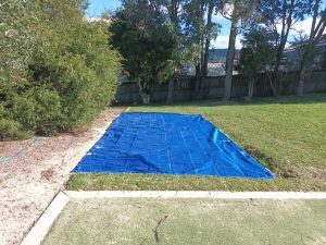 Sandpit Cover with weighted edges keeping the sand pit safe and deterring pests