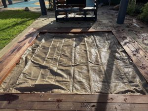 Square sandpit cover providing a safe sandpit for children